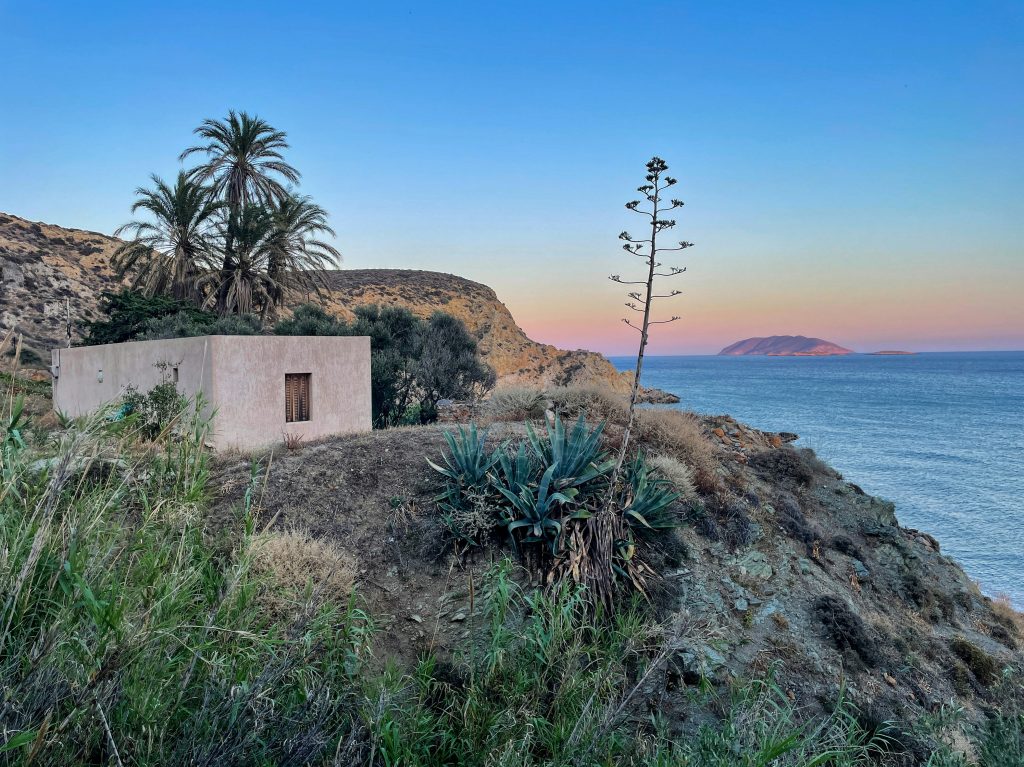 a house on a cliff overlooking the ocean