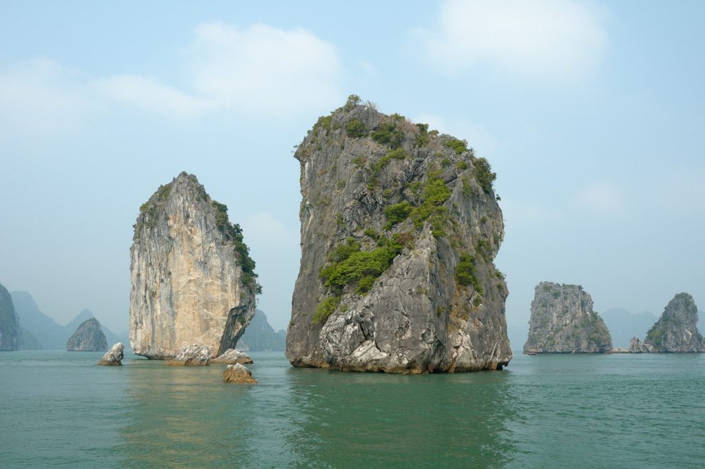 Limestone karst towers rising from Ha Long Bay, Vietnam