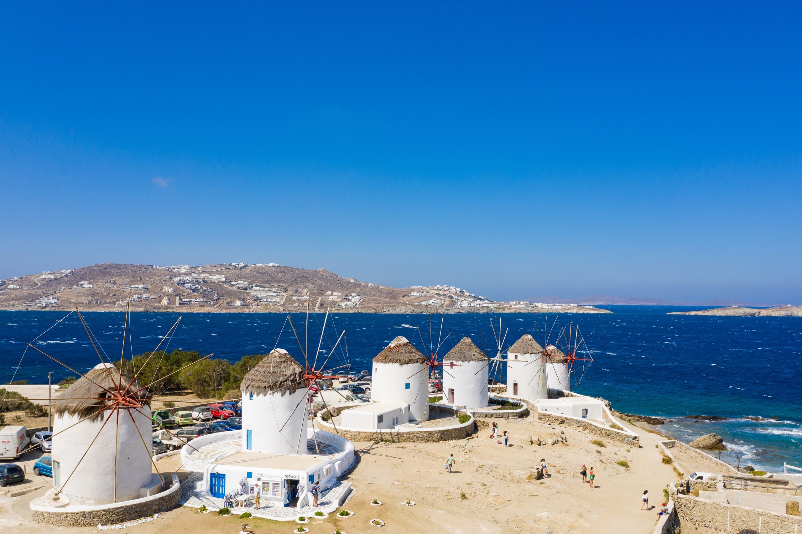 A closer view of the windmills in Little Venice in Mykonos, Greece