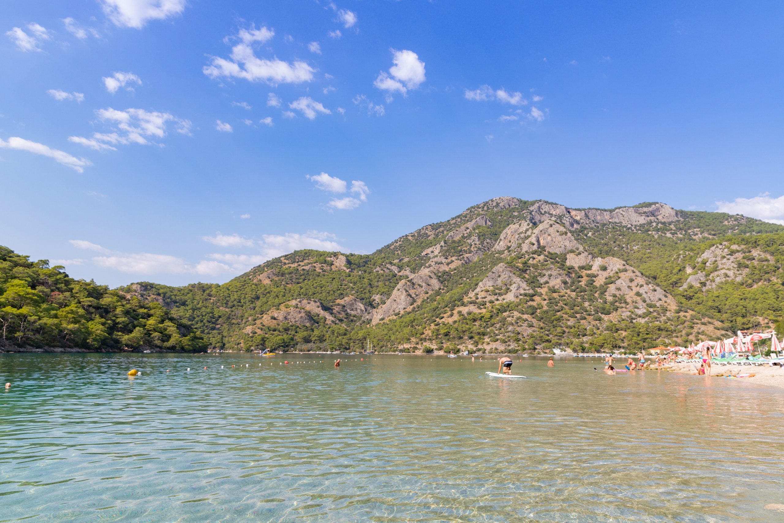 Sunbathers and swimmers at the Blue Lagoon beach in Ölüdeniz on Turkey's Turquoise Coast
