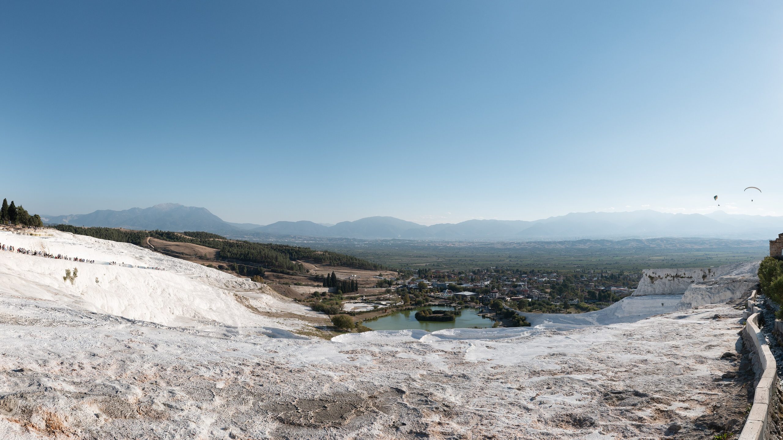 The white travertine terraces of Pamukkale overlooking the valley in southwestern Turkey